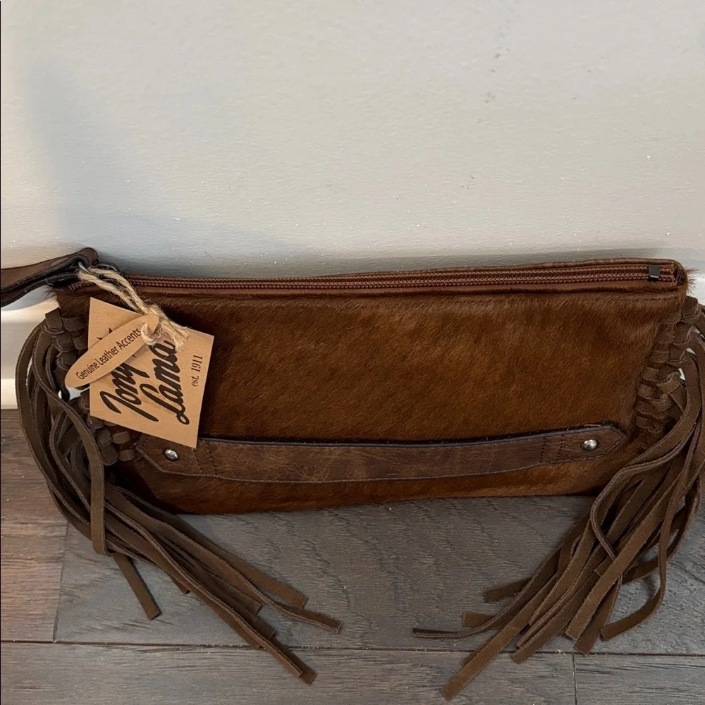 Tony Lama Genuine Leather accents,hair hide, fringe,zip top & interior,3 card